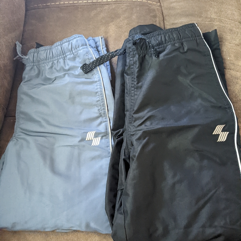 2 pairs of lined windbreaker pants